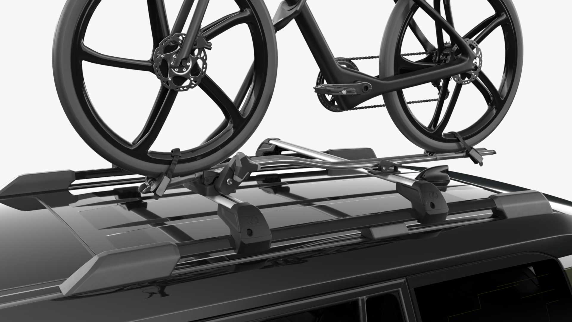 Close-up shot of Lexus GX roof carrying a bike with the optional bike rack accessory. 