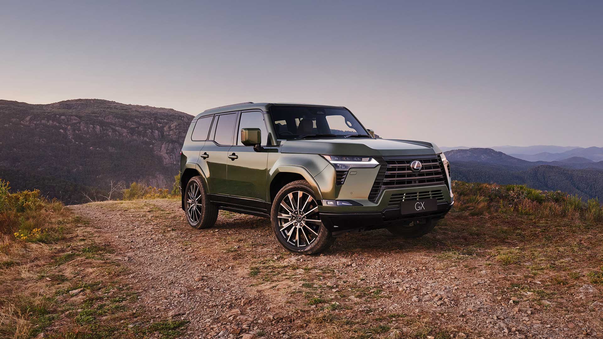 Lexus GX Sports Luxury model parked on a rocky clifftop. 