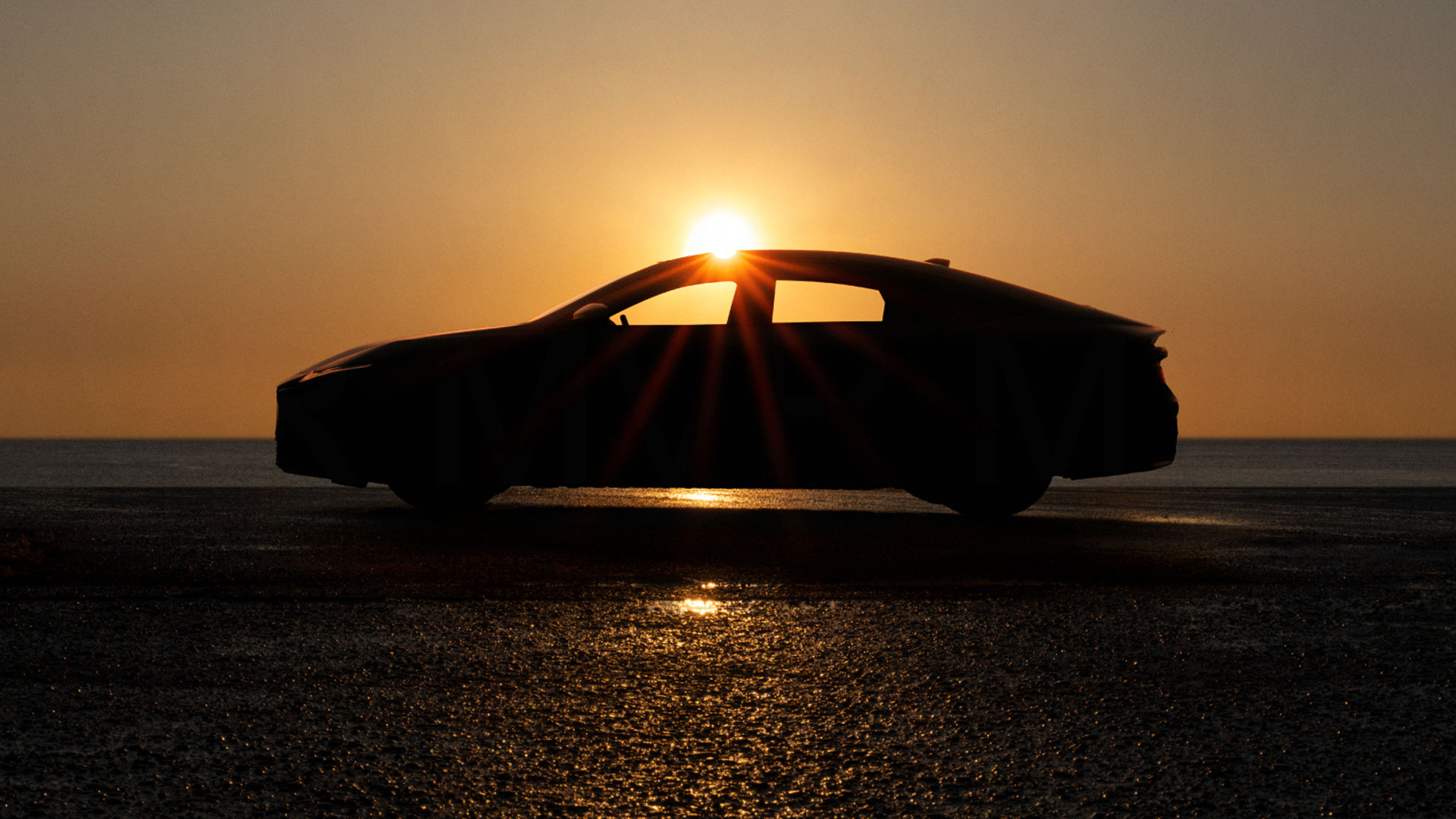 A silhouette of a Lexus ES vehicle with the sun behind it