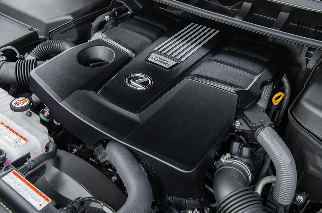 A black engine with the Lexus logo