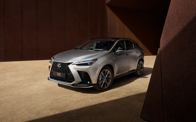 Silver Lexus NX SUV parked in a modern architectural space
